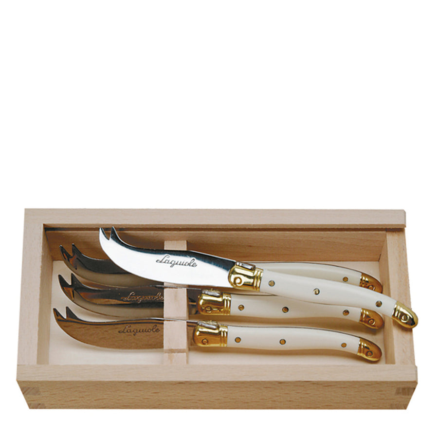 4 Cheese Knives with Ivory colored handles in a wood Box