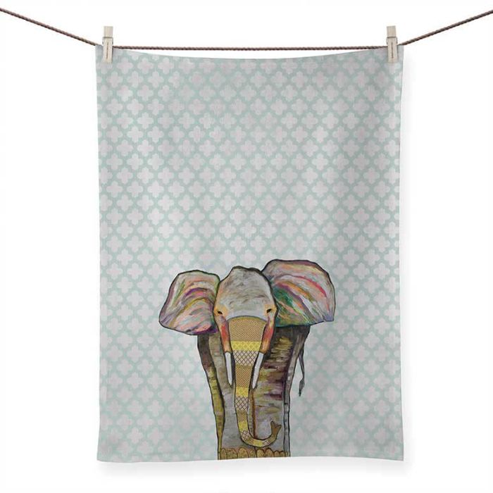 Trendy Trunk On Patterned Turquoise Tea Towel